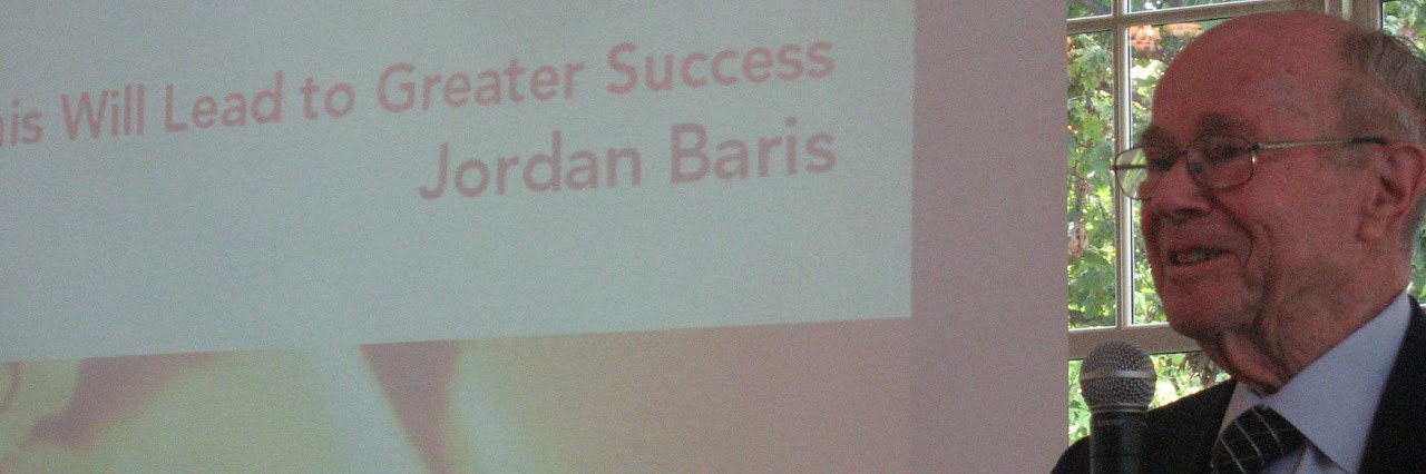 Jordan Baris, founder of BHHS Jordan Baris Realty, presenting